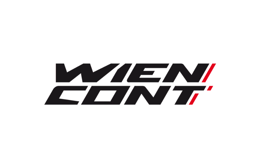 Logo von „Wien Cont" in fett-kursiver schwarzer Schrift mit zwei roten Schrägstrichen zwischen den Wortteilen „Wien" und „Cont". Transparenter Hintergrund.